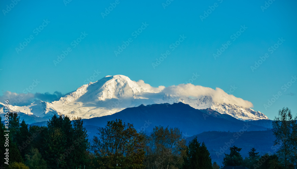 Beautiful view of mountain Baker from the Fraser Valley in evening time