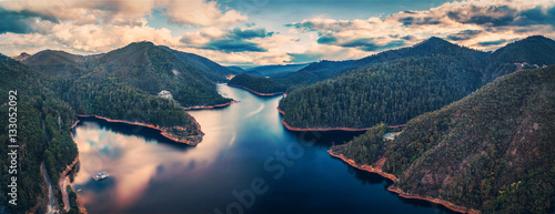 Beautiful Cethana lake and surrounding forest aerial panorama. Cethana, Tasmania, Australia © Greg Brave