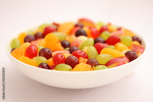  summer fruit bowl on  wooden background 