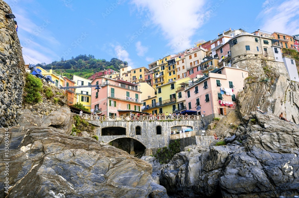 Manarola town, Riomaggiore, La Spezia, Liguria, northern Italy. The colourful houses on hills, the sea, balconies and windows. Part of the Cinque Terre National Park and a UNESCO World Heritage Site.