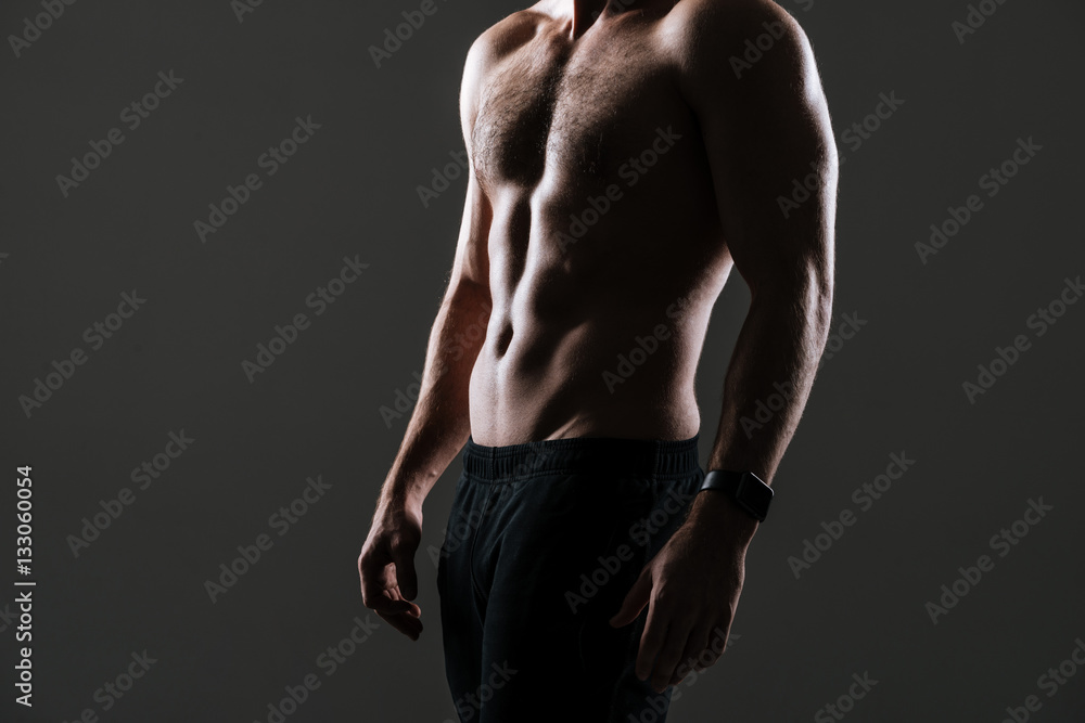 Cropped picture of attractive sportsman Cropped picture of attractive sportsman