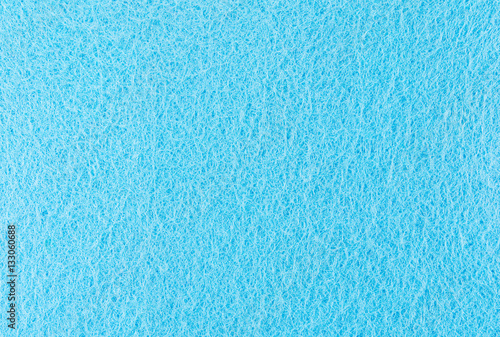 Blue polyester smooth fabric closeup. May use as background
