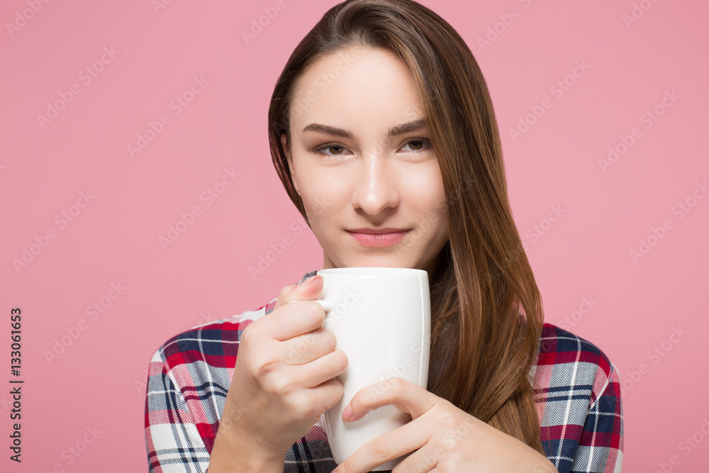 beautiful girl enjoying cup of tea over pink background isolated beautiful girl enjoying cup of tea over pink background isolated