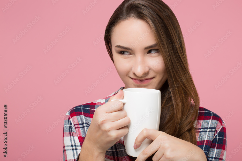 beautiful girl enjoying cup of tea over pink background isolated beautiful girl enjoying cup of tea over pink background isolated
