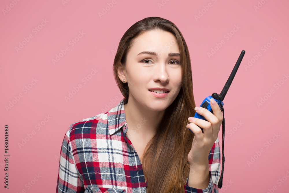 girl using walkie talkie to communicate isolated girl using walkie talkie to communicate isolated
