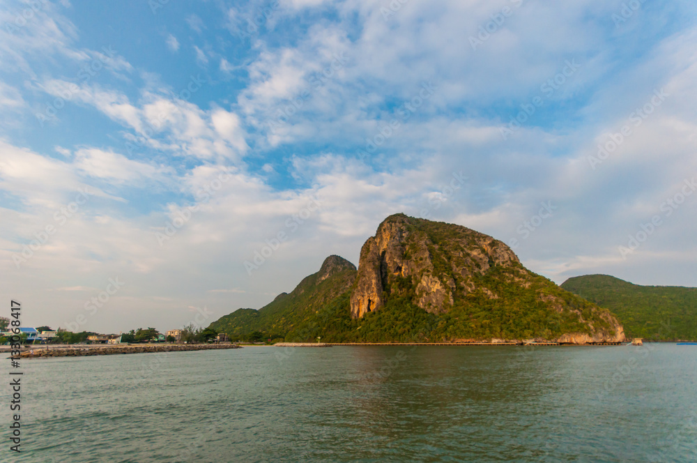 Mountain on Shore with Blue Sky in the Morning. Mountain on Shore with Blue Sky in the Morning.