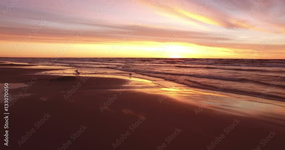 Sunset over the sea. The video was filmed with drone. Sunset over the sea. The video was filmed with drone.