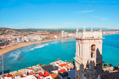 View of the sea from a height of Pope Luna's Castle. Valencia, Spain.  Peniscola. Castellón. The medieval castle of the Knights Templar on the beach. Beautiful view of the sea and the bay. photo