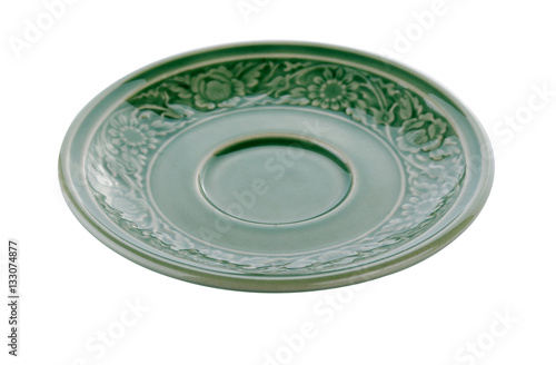 Empty green ceramic plate isolated on white background