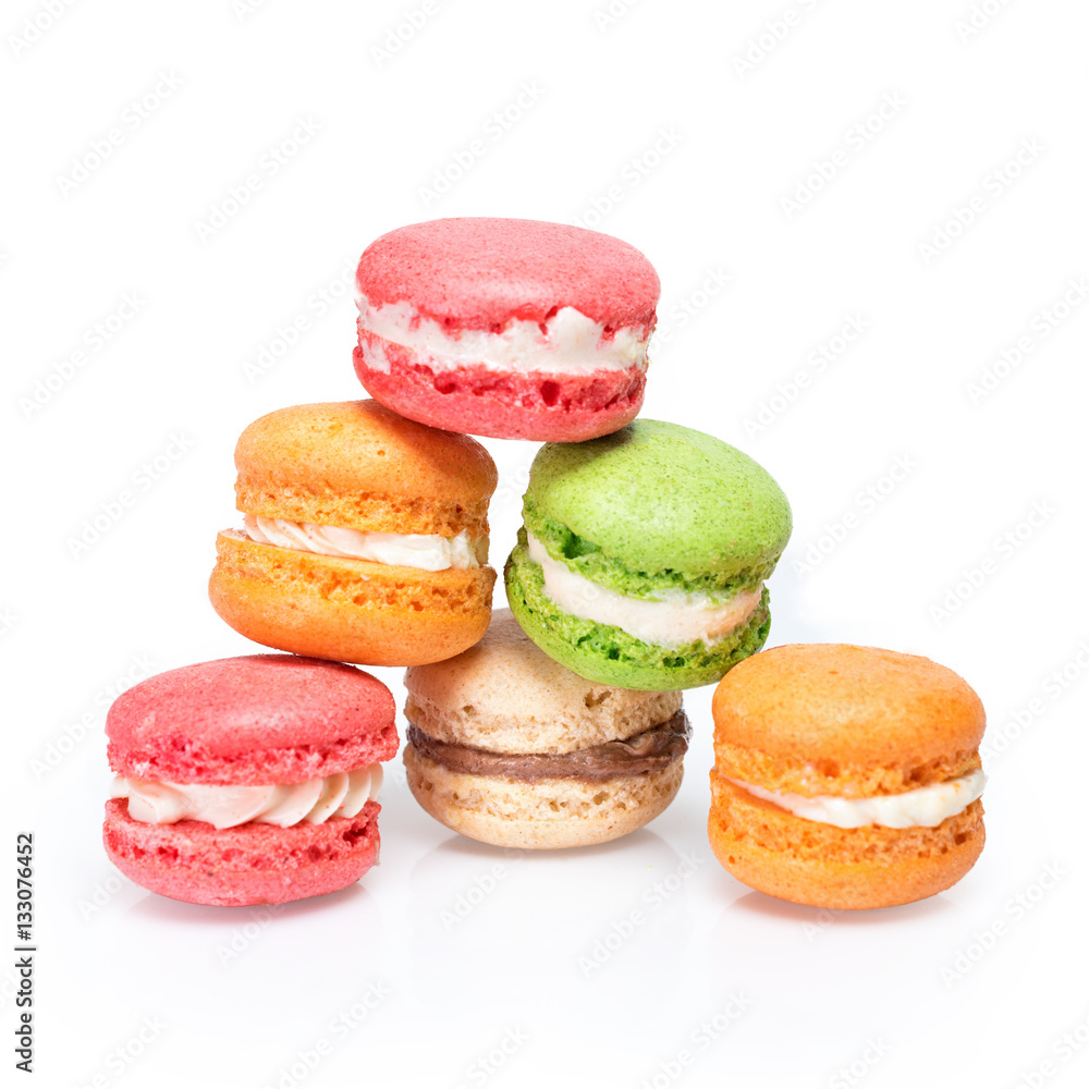 Colorful macaroons isolated on white. Traditional french dessert macarons.