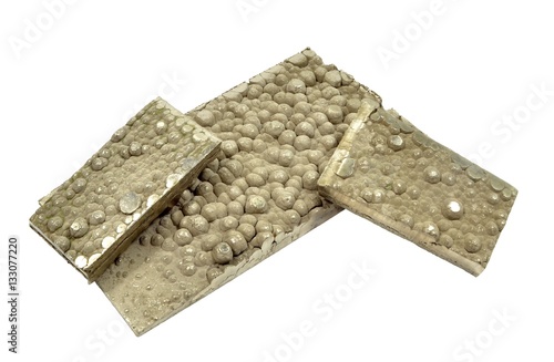 Cut strips cathode nickel plates - one of products non-ferrous metallurgy plants.  Closeup, isolated, white background