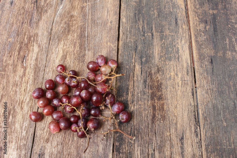 Grape red fresh on wooden table background,Top view Grape red fresh on wooden table background,Top view