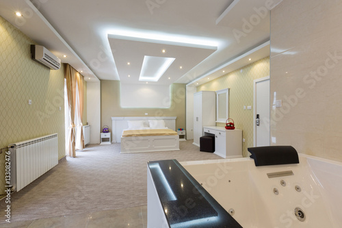 Hydro massage baths in hotel bedroom