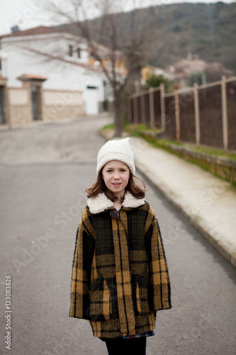 Beautiful girl with wool hat at winter