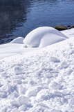 Snow Covered Mountain Lake Shore. Winter Landscape.
