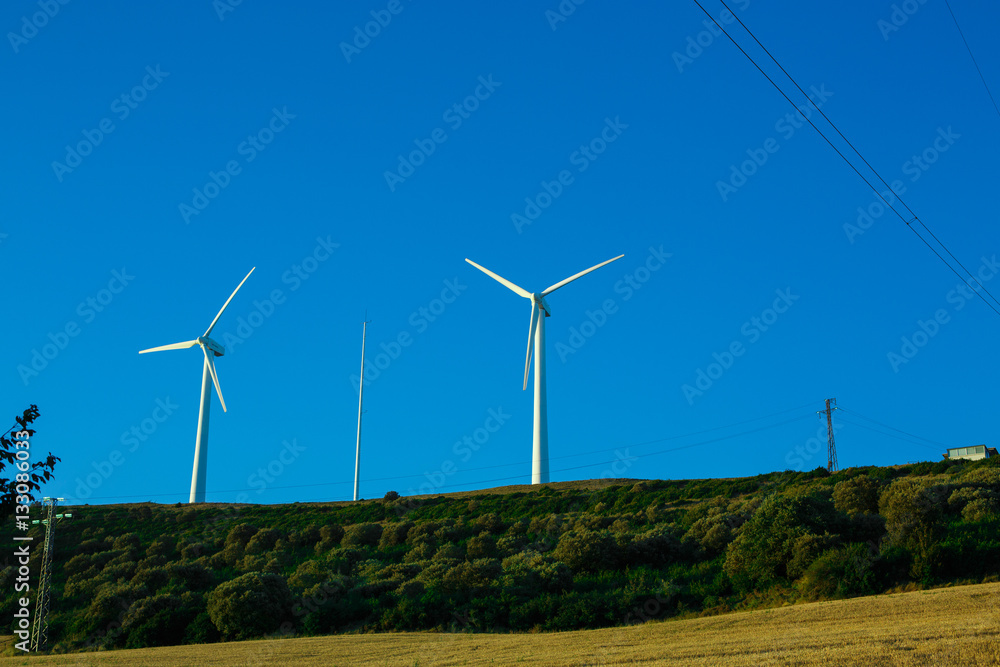 Spanish village landscape with windmills Spanish village landscape with windmills