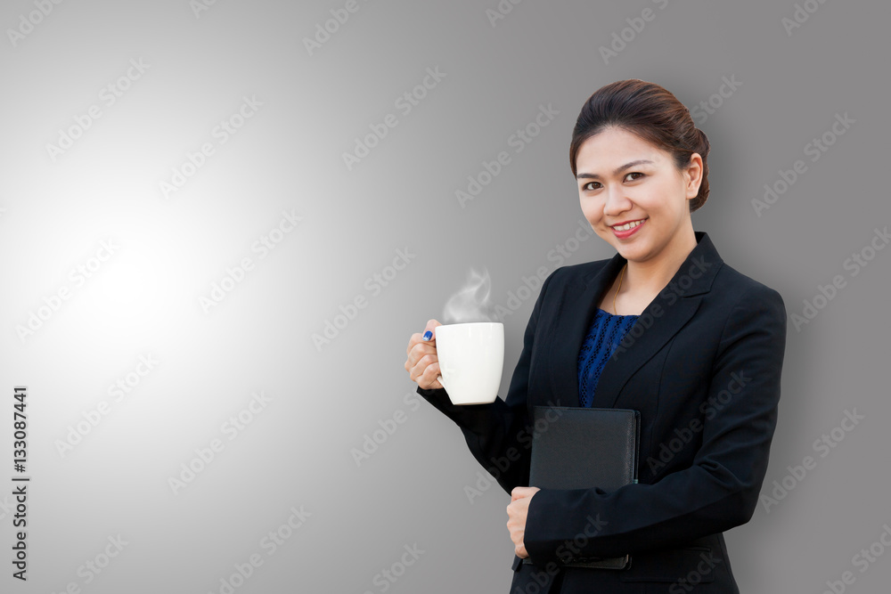 Business woman is holding white mug with copy space Business woman is holding white mug with copy space