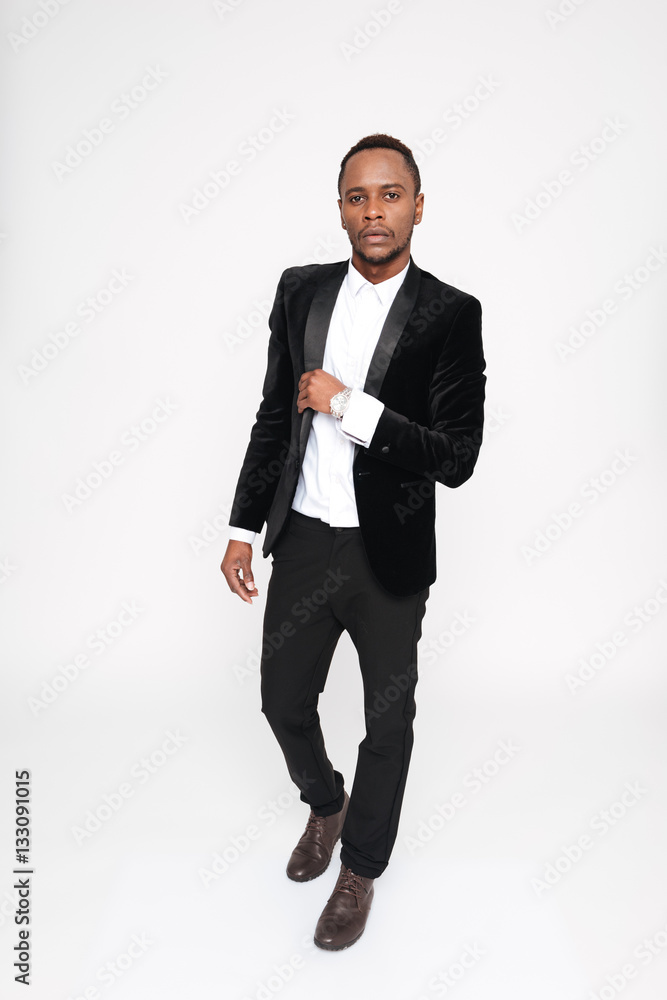 Vertical image of young african man in suit Vertical image of young african man in suit