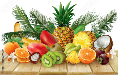 Tropical fruits collection on a wooden surface