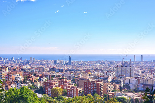 Barcelona city View from Park Guell at sunrise. Beautiful blue sky © castecodesign