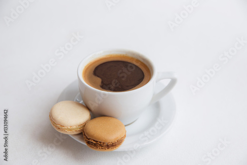 Cup of coffee with macaroons, americano, espresso, white space, background, selective 