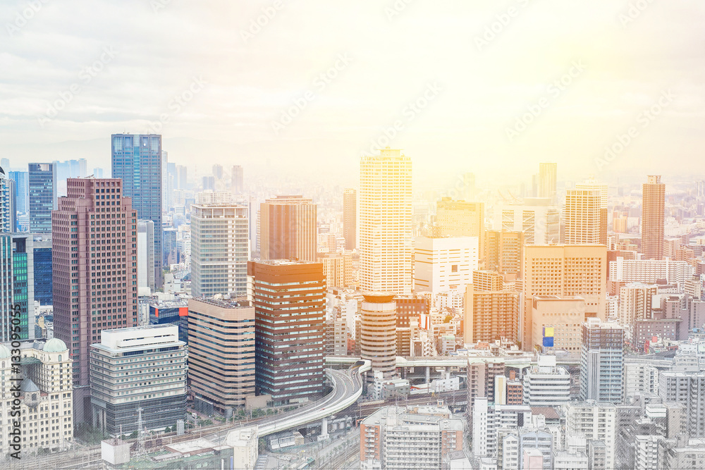 Asia Business concept for real estate - panoramic modern cityscape building bird eye aerial view under sunrise and morning blue bright sky in Osaka, Japan. Mix hand drawn sketch illustration