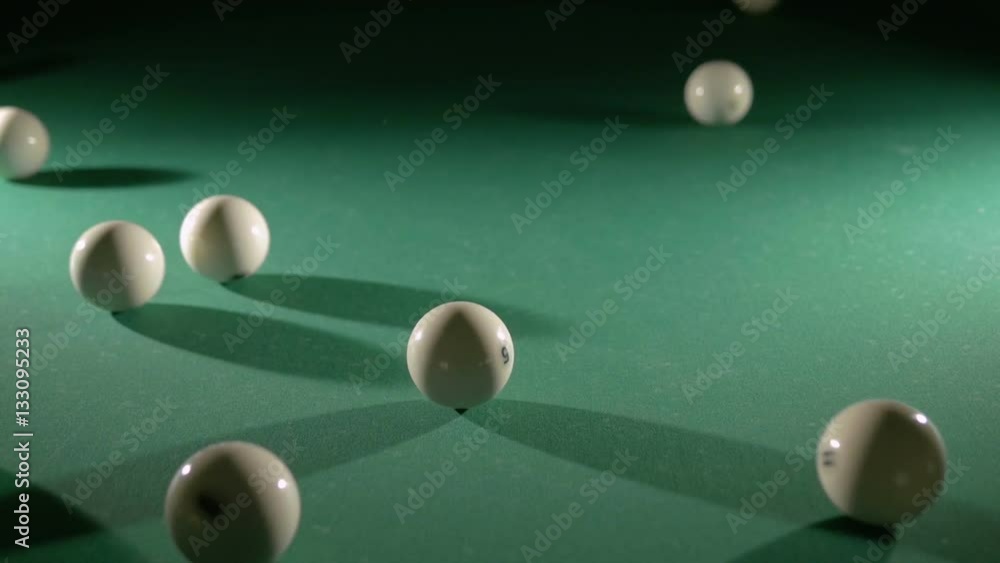 Russian billiards, the first blow, breaking the pyramid. Close-up Russian billiards, the first blow, breaking the pyramid. Close-up
