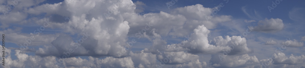 Fototapeta premium Heavenly landscape with clouds. Cumulus clouds in the sky