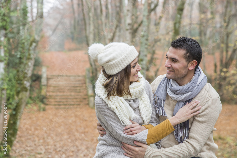 Young couple Walking Winter Woodland Young couple Walking Winter Woodland