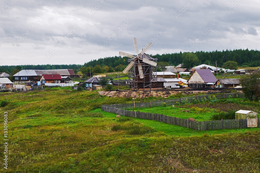 Beautiful old mill outside the city. Nizhnyaya Sinyachikha, Sverdlovsk oblast, Russia. Beautiful old mill outside the city. Nizhnyaya Sinyachikha, Sverdlovsk oblast, Russia.