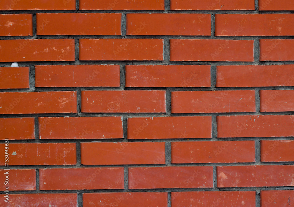 Obraz premium Red brick wall texture background. Tiled.