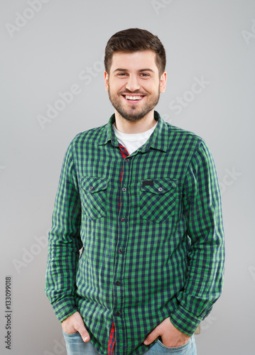 Man in green checked T-shirt