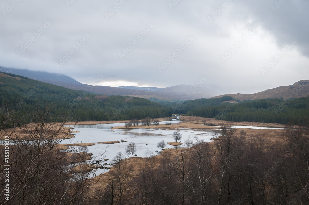 Kingie Pool and the River Kingie in Lochaber, Scotland with heavy weather approaching.