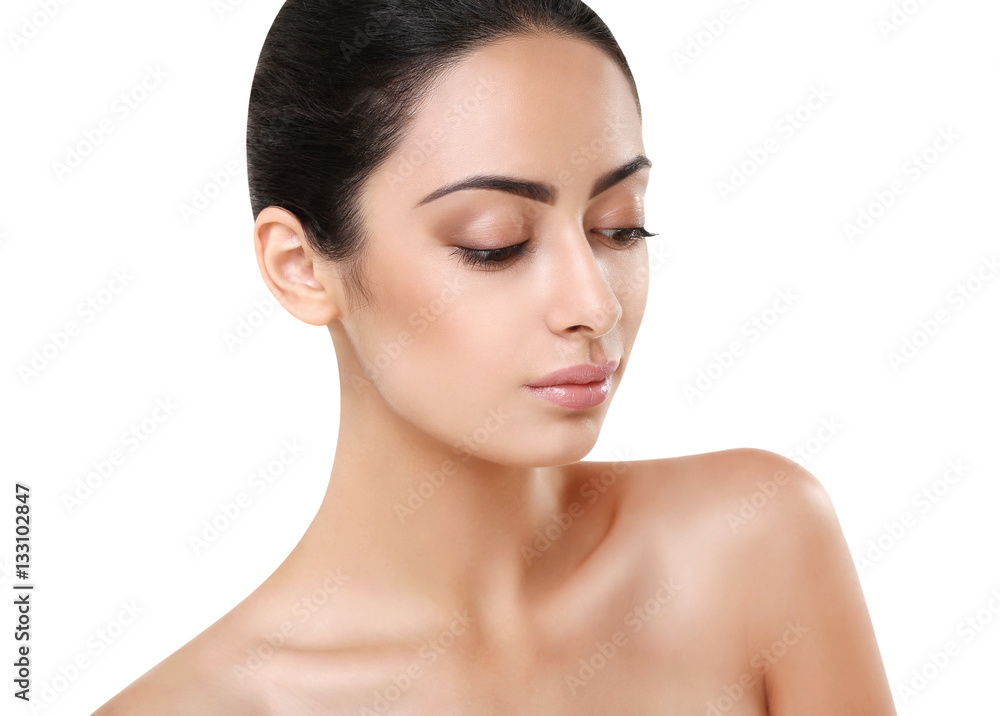 Beautiful indian girl with perfect skin looks down Beautiful indian girl with perfect skin looks down