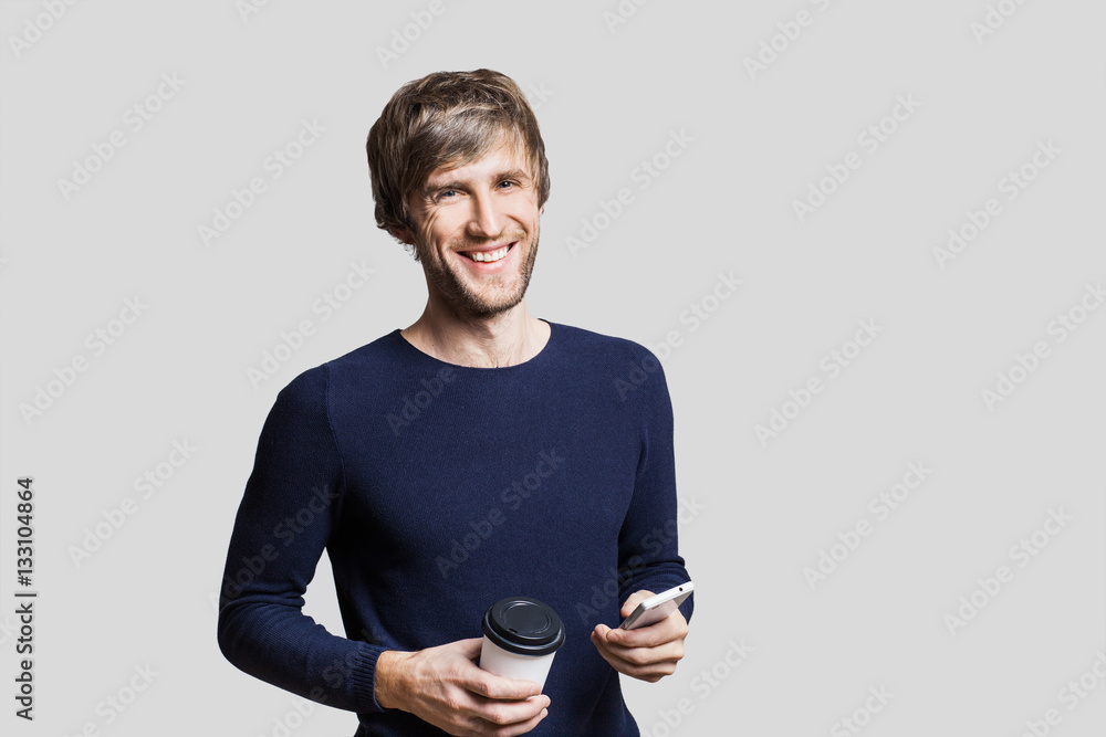 Handsome laughing young man studio portrait Handsome laughing young man studio portrait