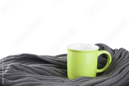 grüne Tasse mit grauen Schal
