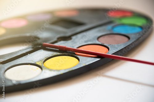 Palette of water color tray on white background, Art metaphor co