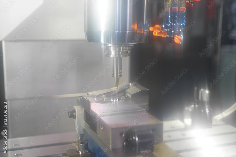 High precision CNC machining center working, operator machining High precision CNC machining center working, operator machining