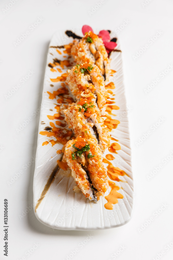Maguro Onigiri (Japanese Rice Ball) : Rice with Ebiko Wrap with Maguro (Bluefin Tuna) Topping with Sauce, Ebiko and Scallion.