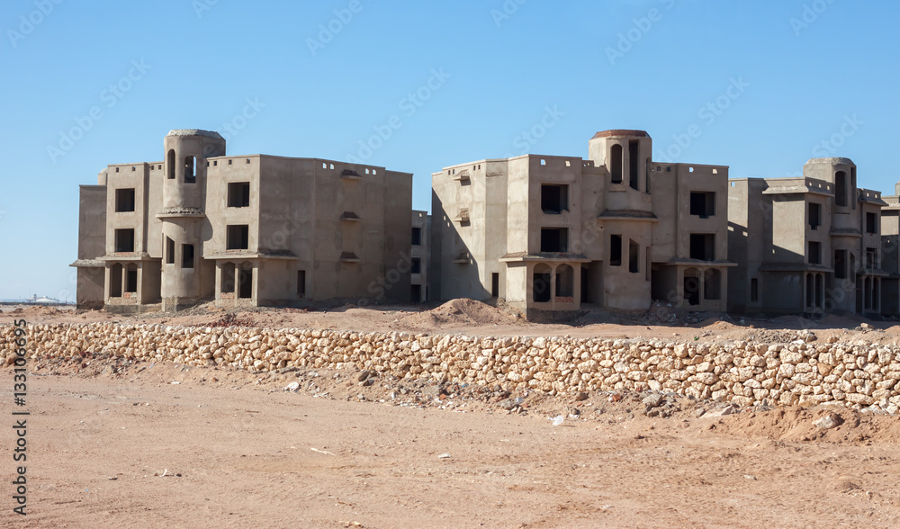 abandoned unfinished houses in Egyptian desert