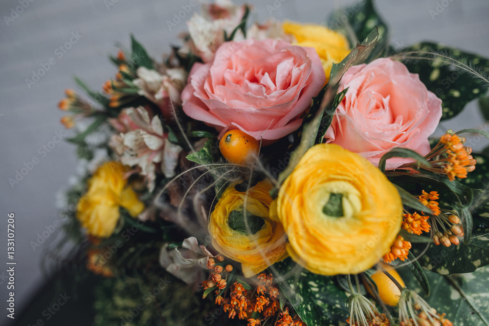beautiful bridal bouquet of different flowers on the table