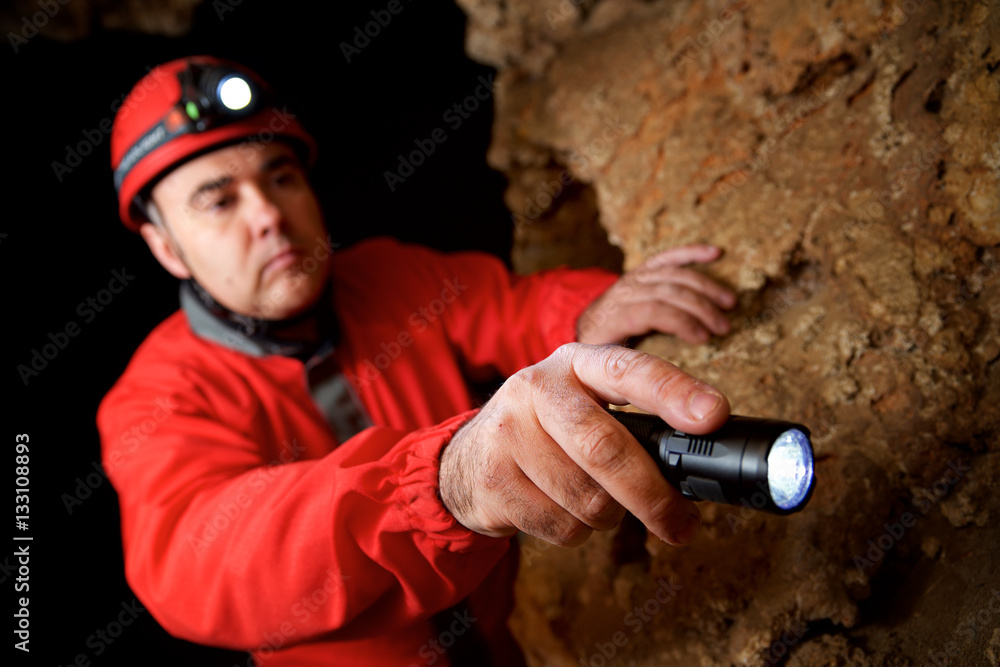 Naklejka premium Caving in Cat Cave, Zaragoza Province, Aragon, Spain.