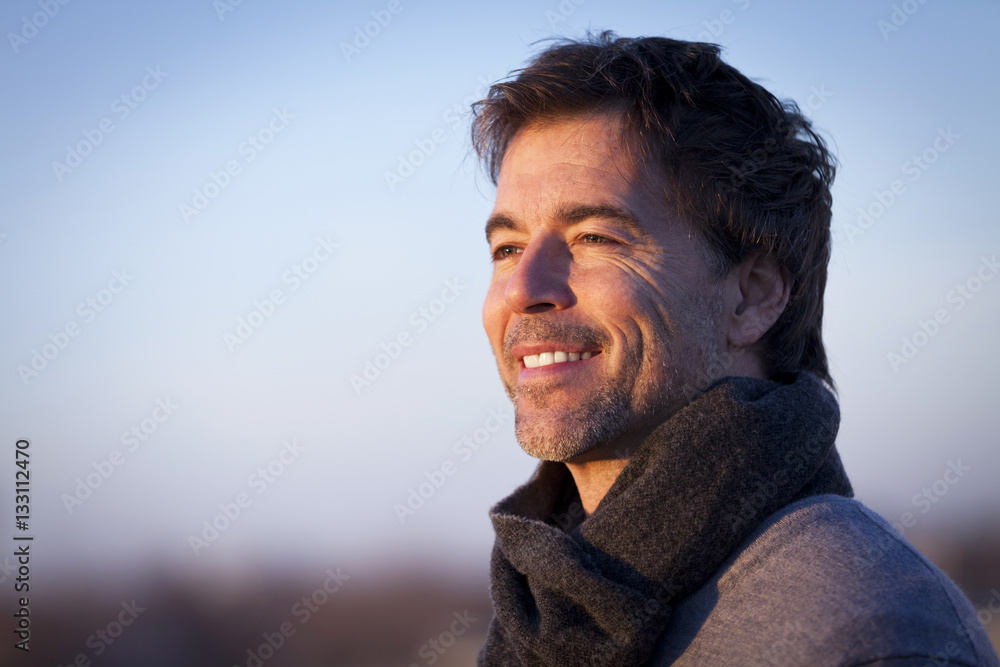 Handsome mature man dreaming on the roof Handsome mature man dreaming on the roof