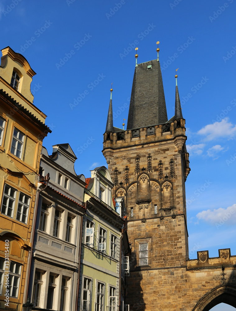 Fototapeta premium High tower with battlements of the Charles Bridge in Prague Old