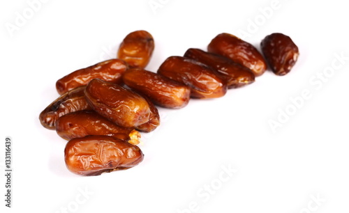 dry dates isolated on white, sweet fruit