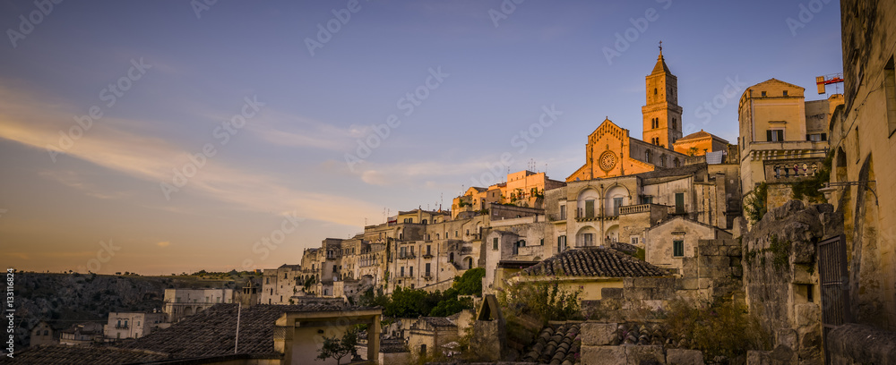 sunset lights the curch in Matera, Italy