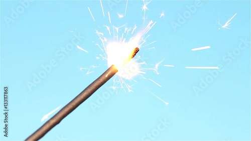 sparkler isolated on blue background