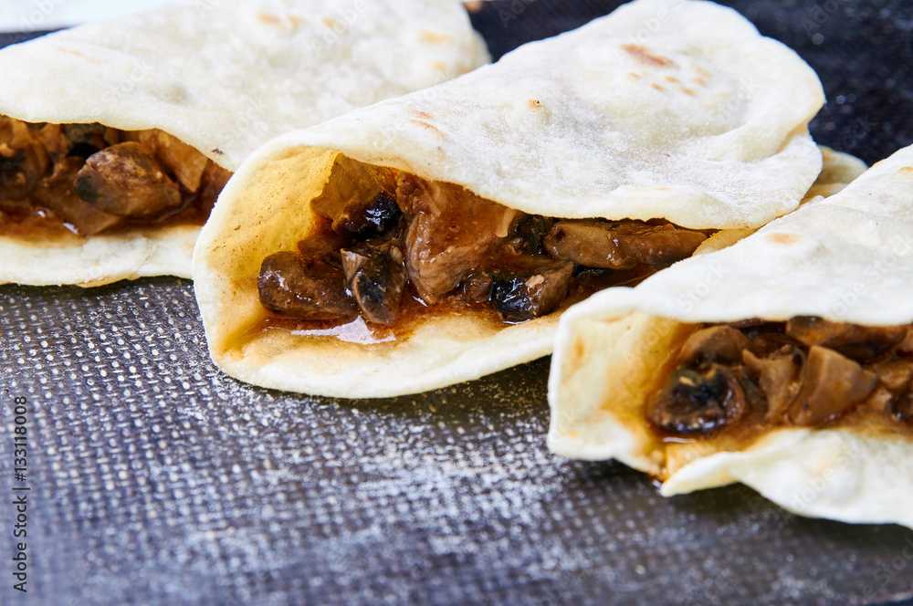 Appetizing food closeup. Indian / Asian cuisine. Roti with meat and ...