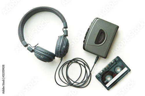 Vintage walkman, audio tape and headphones.