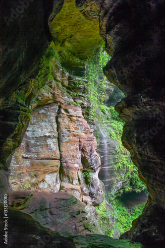 Rock House Waterfall - Waterfall on cliff side viewed from Rock House Cave in Hocking Hills State Park, Ohio